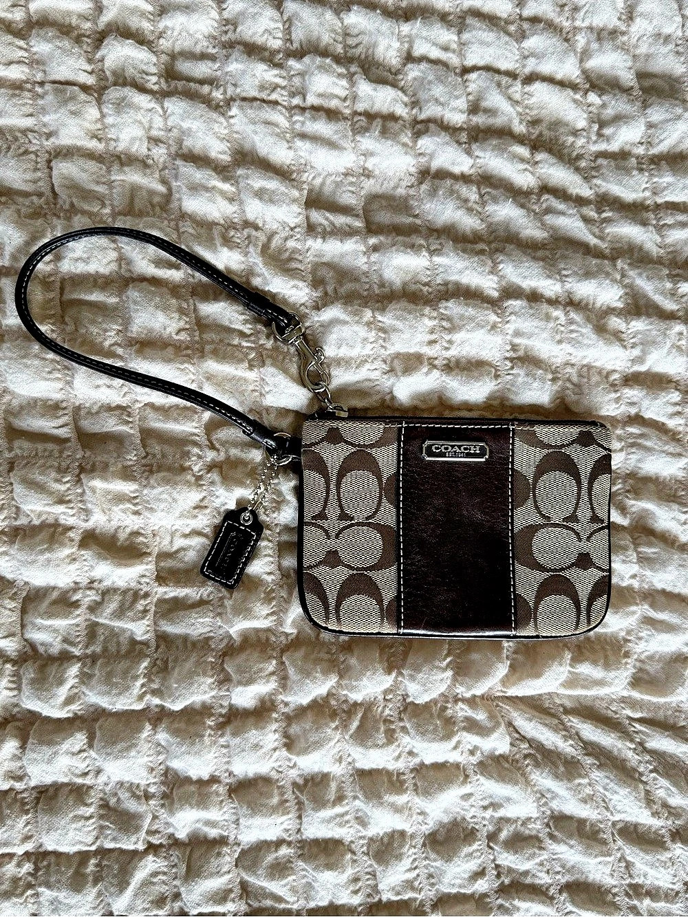 Coach Corner Zip Wristlet In Signature Canvas With Stripe Signature Canvas Brown